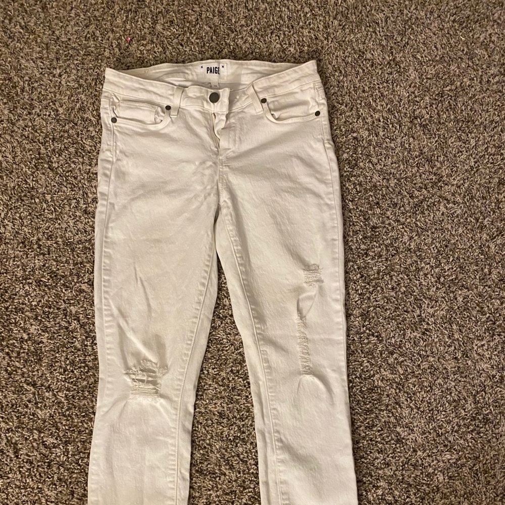 White Paige jeans with hole at knee
